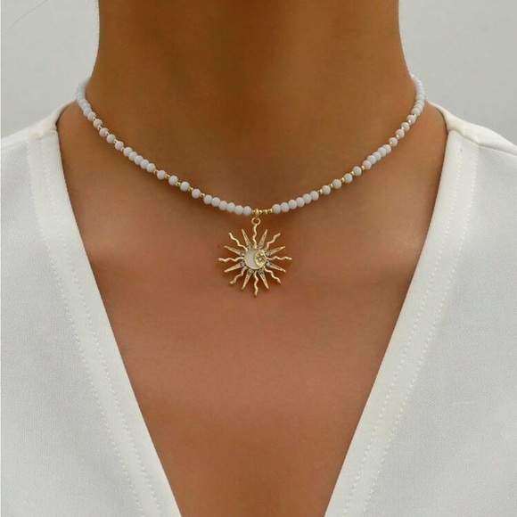 Anthropologie Gold and beaded White Necklace with Sunburst Pendant summer 2025 - Picture 2 of 4